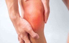 man with muscle pain on grey background. Elderly have knee ache due to Runners Knee or Patellofemoral Pain Syndrome, osteoarthritis, arthritis, rheumatism and Patellar Tendinitis. medical concept