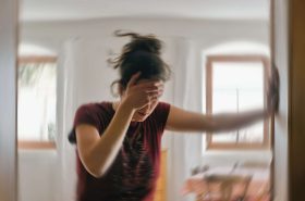 Vertigo Physio woman's head spinning from vertigo